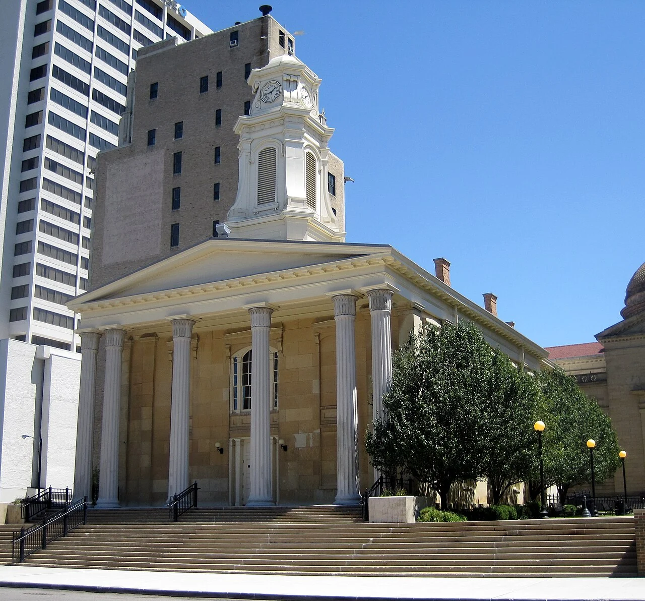 The Old St. Joseph County Courthouse’s white columns and clock tower in South Bend.