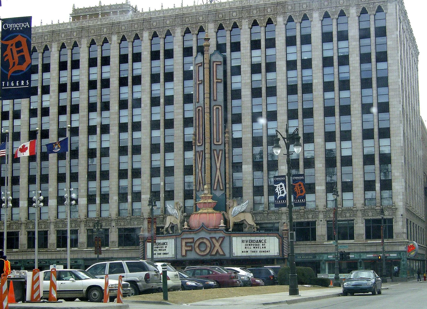 The Fox Theatre in Detroit, showing its ornate façade and vertical Fox sign.