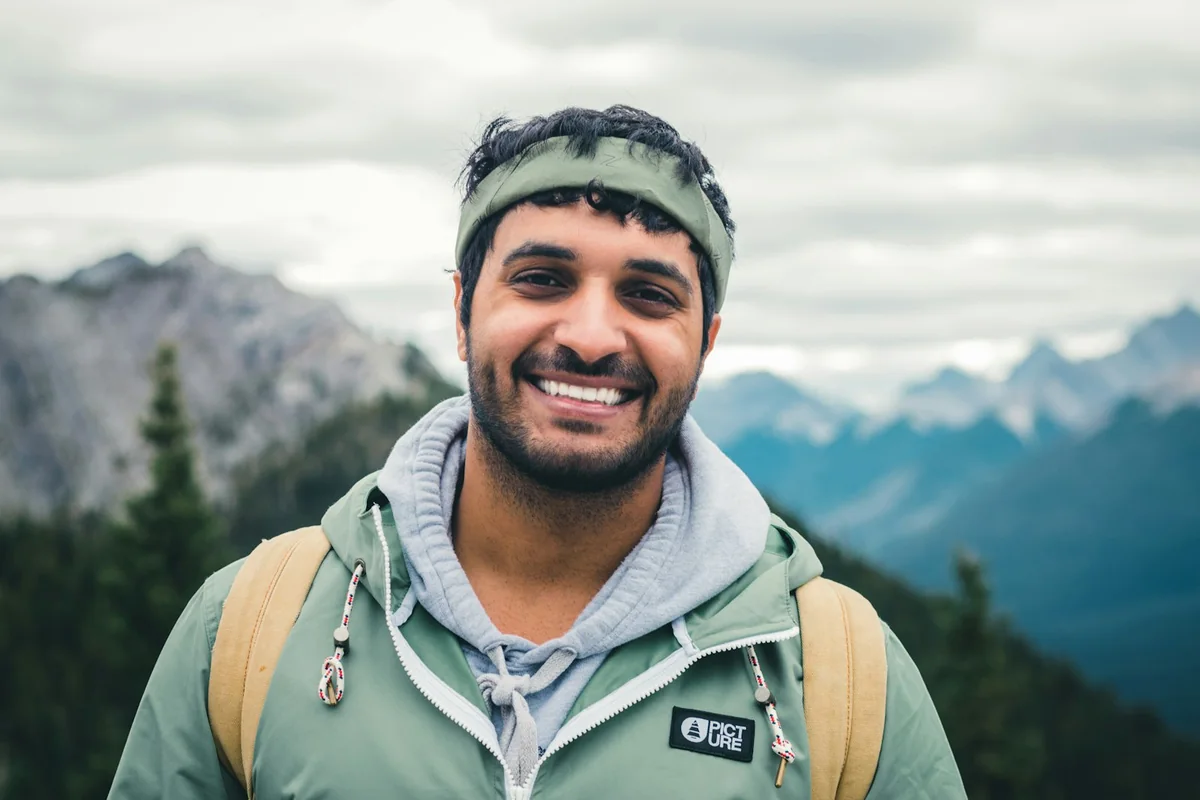 An adult man outdoors